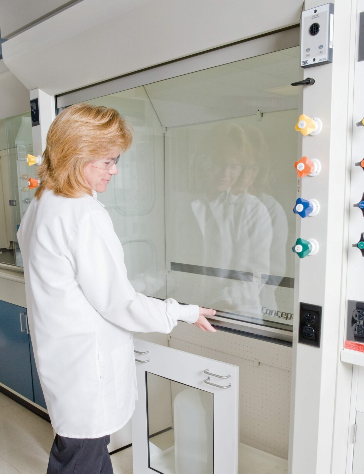 Scientist Using Fume Hood